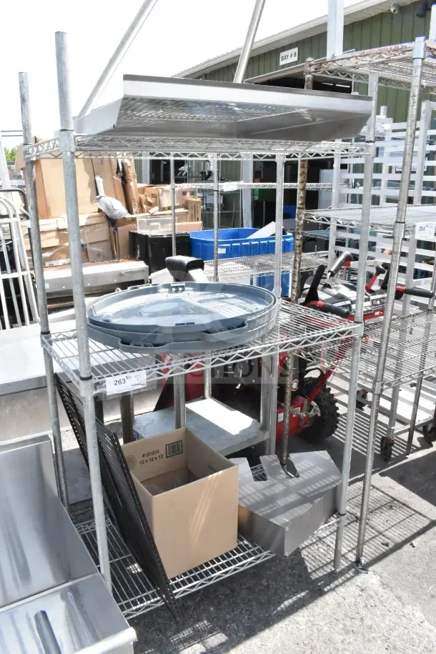 Chrome finish 3-tier wire shelving unit with contents, includes lid organizer. Note: Buyer must dismantle for shipping.