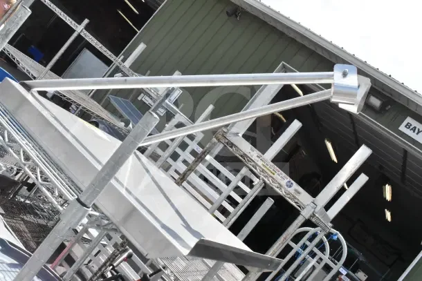 Chrome finish 3-tier wire shelving unit with organizer. Good condition. Buyer must disassemble. Freight charges apply.