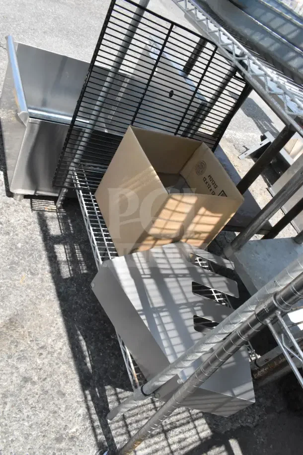 Chrome finish 3-tier wire shelving unit with lid organizer and contents. Buyer must dismantle. Consider freight charges.