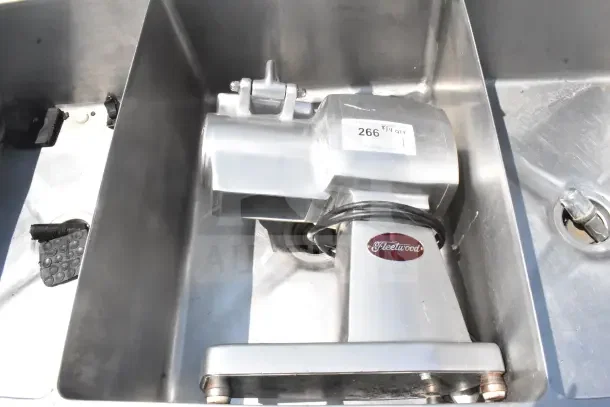 Fleetwood countertop cheese grater, 115 volts, 1 phase, stainless steel, with Fleetwood logo and auction label 266/1.