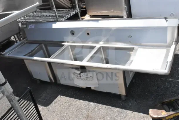 BRAND NEW Steelton 54" 3-compartment commercial sink, scratch and dent, two 12" drainboards, model 522CS31014LR, no legs.