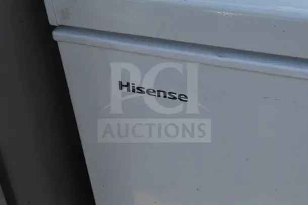 Hisense chest freezer, white, 115 volts, 1 phase, lightly marked exterior, visible brand logo.