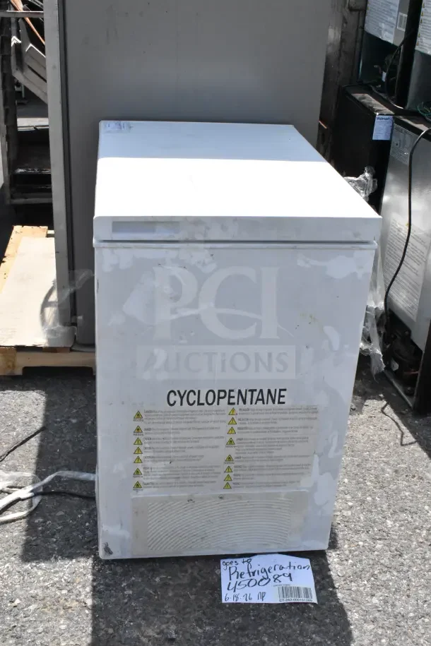 Hisense Chest Freezer, 115 Volts, 1 Phase, labeled "CYCLOPENTANE," visible wear on exterior.