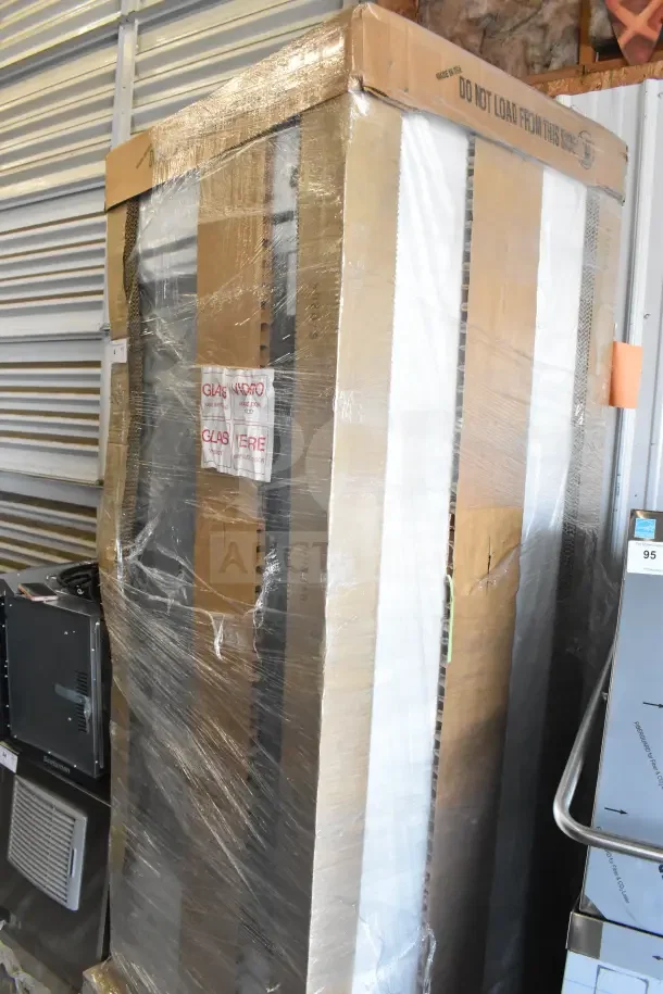 Brand new True TSCI-600R-G-PH cooler in packaging, 115V, single-phase, commercial single door, scratch and dent condition.