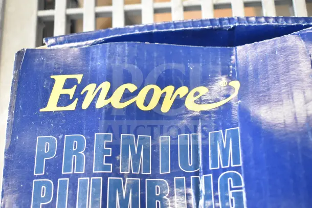 Brand new Encore water dispenser, in original blue box labeled "Premium Plumbing." Unopened, perfect condition.