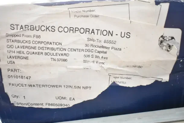 New Encore Water Dispenser in box, labeled for Starbucks Corporation. Includes part number 011018147, faucet watertower 12in.