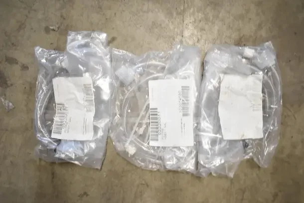 18 new items in sealed bags, including 92220011, K6463 thermometers, hoses; labels show model numbers and barcodes.