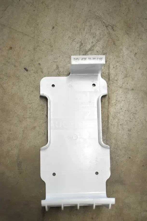 White plastic mounting bracket with "PUSH HERE TO RELEASE" text, brand new, part of 18-item auction lot.
