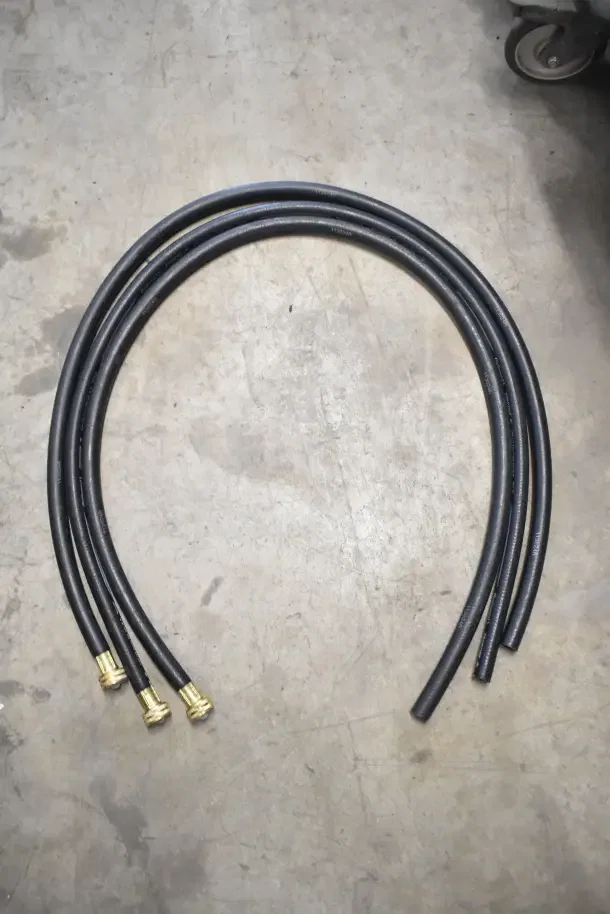 New black hoses with brass fittings, part of 18-item auction lot including a K6463 thermometer, brand new in box.