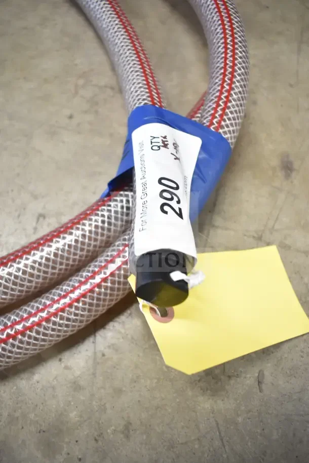 Flexible hose with tag showing "290 QTY" and packaging label, part of 18 new boxed items including thermometers.