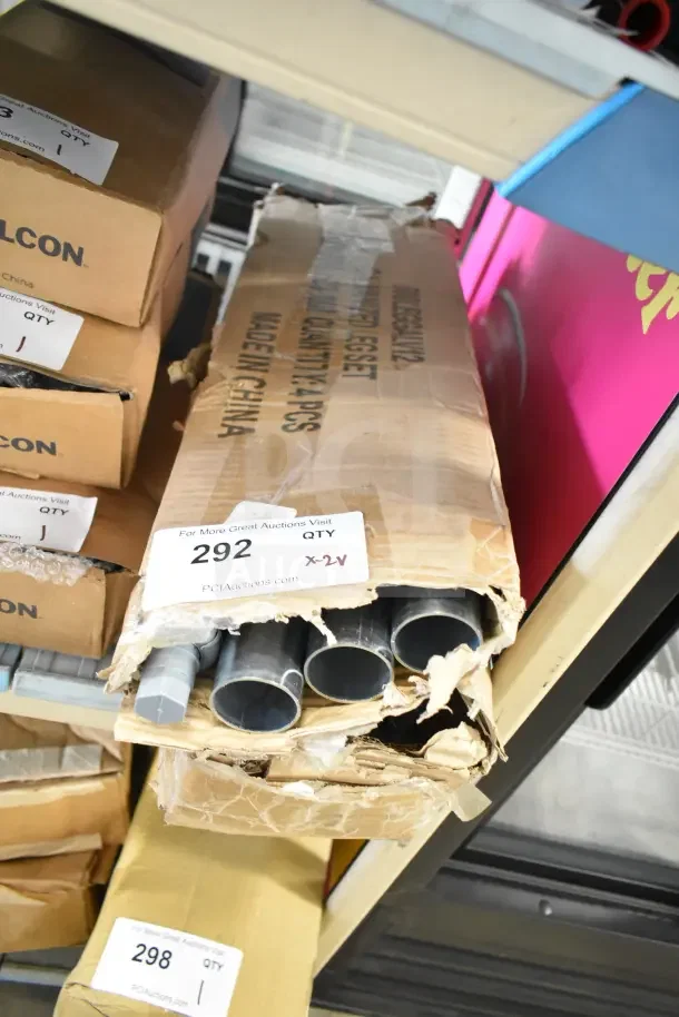 Box with metal legs and adjustable shelving brackets, partially opened. Label indicates "Made in China." Auction lot 292.