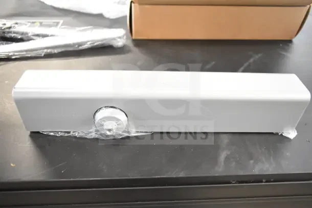 Brand new Falcon SC81A door closer in box, silver finish, with plastic wrapping. Ideal for commercial use.