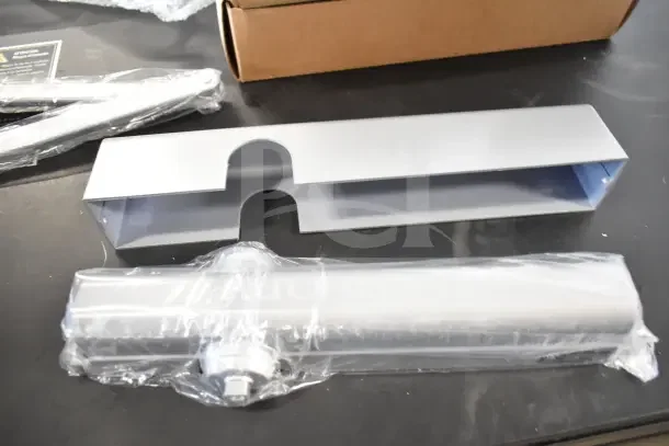 Brand new Falcon SC81A door closer, still in packaging, includes mounting hardware, box shown.