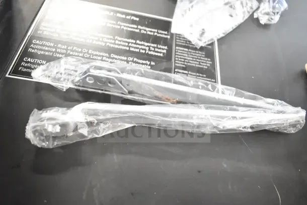 Brand new Falcon SC81A door closer, in original packaging, includes parts wrapped in plastic, labels showing caution instructions.
