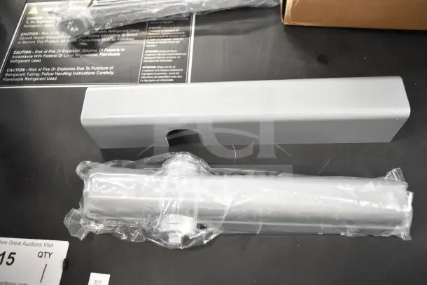 Brand new Falcon SC81A door closer in original packaging, featuring a sleek silver finish. Includes installation components.