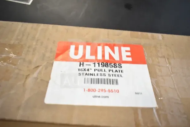 Brand new Uline H-11985SS pull plate, stainless steel, 16x4 inches. Box labeled with model and contact info.