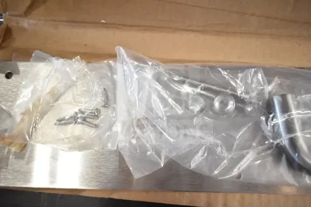 Brand new Uline H-11985SS pull plate in box, with screws and mounting hardware in plastic bags.