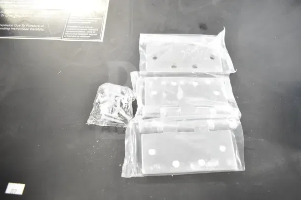 New hinges set in sealed plastic bags, includes screws. Four complete sets, pristine condition, ready for installation.