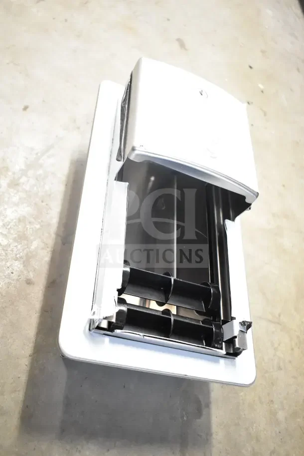 Brand new Roval 10-20031 toilet tissue dispenser, silver finish, durable design, with dual roll capacity.