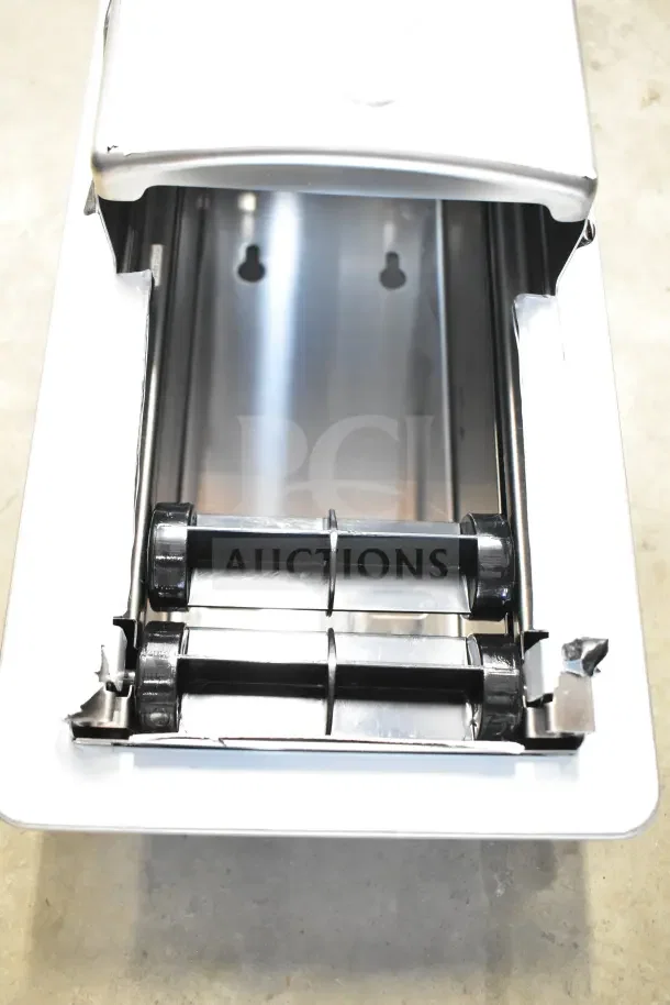 Brand new Roval 10-20031 toilet tissue dispenser, stainless steel finish, dual roll capacity, wall-mount design.