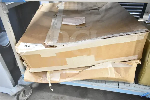 Brand new Follett Ice Manager Diverter Valve System and Ice Transport Tube Kit in original, taped boxes. Auction label visible.