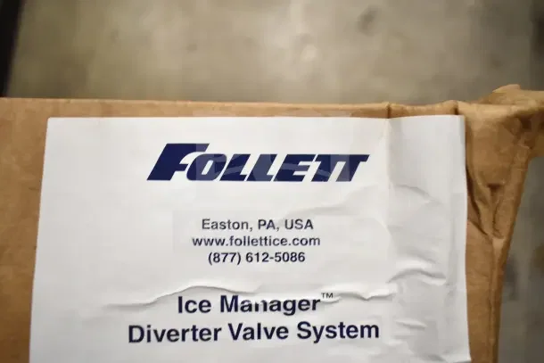 Brand new Follett Ice Manager Diverter Valve System in box, includes Ice Transport Tube Kit. Box label shows contact info.