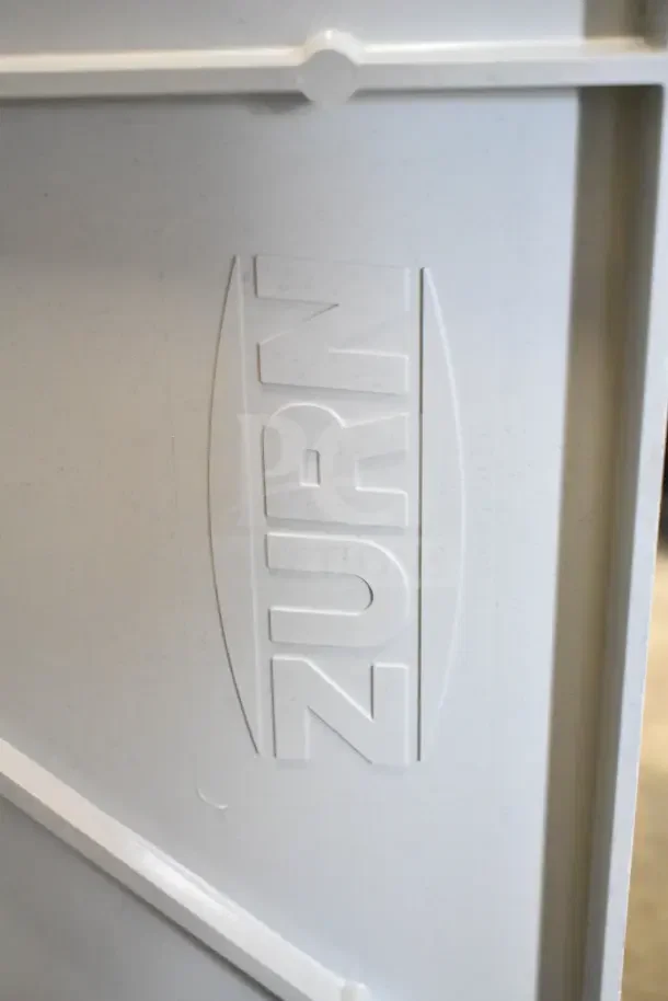 Brand new Zurn poly mop sink, embossed logo, pristine condition, durable construction; auction lot of two.