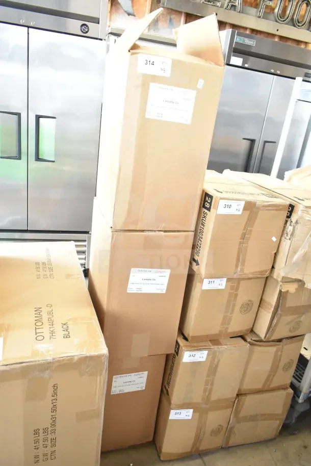 Three new scratch and dent Oliver Tuck Top Boxes, labeled with item tags, stacked for auction.