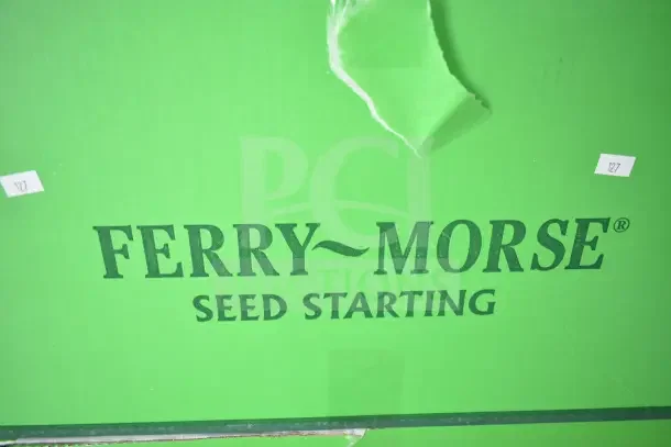 Two brand new scratch and dent Ferry Morse Seed Starter boxes, green packaging, marked with "127."