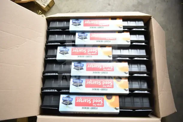 Two boxes of Ferry Morse seed starters, 18 pots each, brand new with slight scratches and dents visible on packaging.