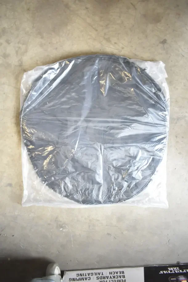 Brand new Coleman smokeless fire pit in packaging. Scratch and dent condition. Ideal for outdoor use.
