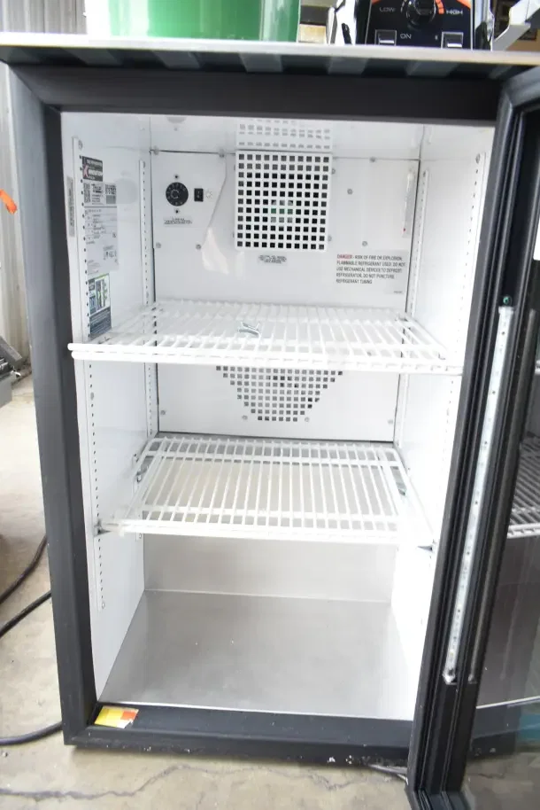 2020 True GDM-06-34-HC commercial mini cooler merchandiser, 115V, 1 phase, two adjustable shelves, well-maintained interior.