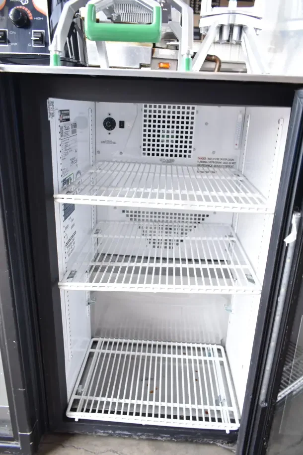 2020 True GDM-06-34-HC commercial mini cooler merchandiser, 115V, 1 phase, with three wire shelves, interior labels visible.