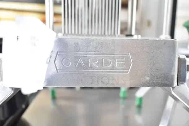 Garde 181ONSLC316 onion/produce slicer, 3/16" blade, new condition, slight scratches, embossed brand logo visible.