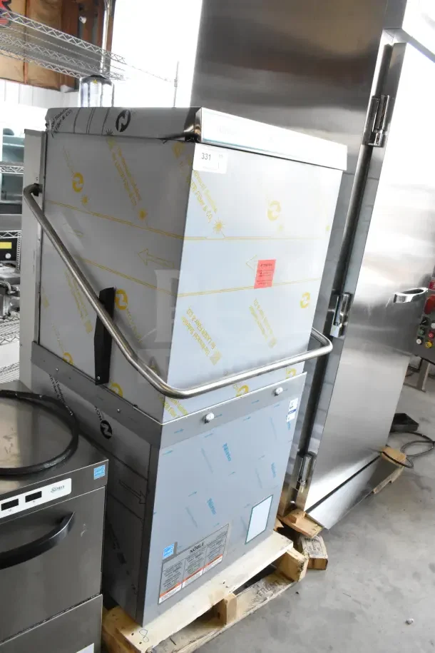 Brand new Noble 495HTDT513 high-temp door-type dishwasher, 208/240V, 3 phase, stainless steel, minor scratches.