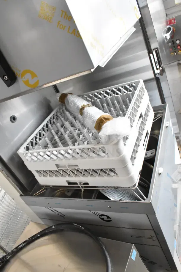 Brand new Noble 495HTDT513 high-temp door-type dishwasher with slight scratches. 208/240V, 3-phase, includes rack.