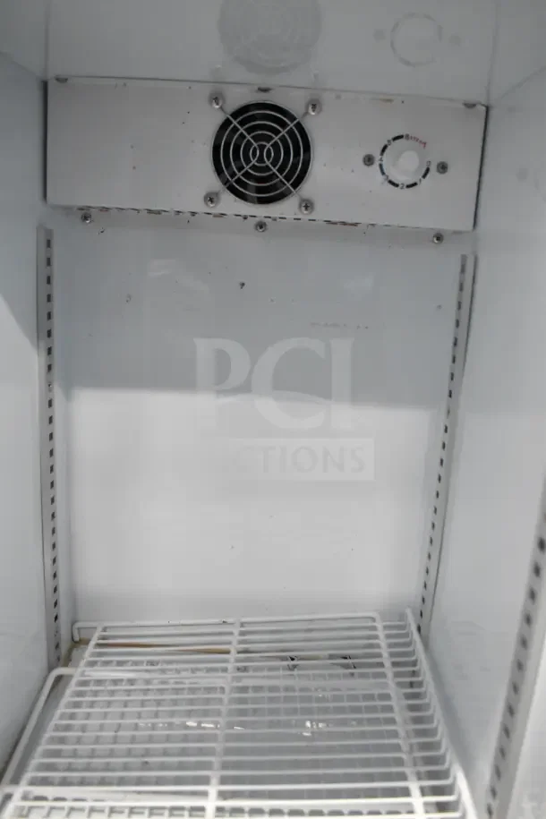 2023 T-50L Mini Commercial Cooler Merchandiser, 115 Volts, 1 Phase, white interior with adjustable shelves and cooling fan.