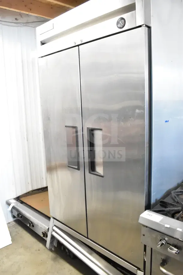 2017 True T-35 commercial 2-door reach-in cooler, stainless steel, 115 volts, 1 phase, good condition.
