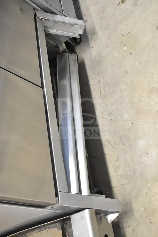 2017 True T-35 Commercial Reach-In Cooler, 2 doors. Stainless steel exterior. 115 Volts, 1 Phase. Minor wear visible.
