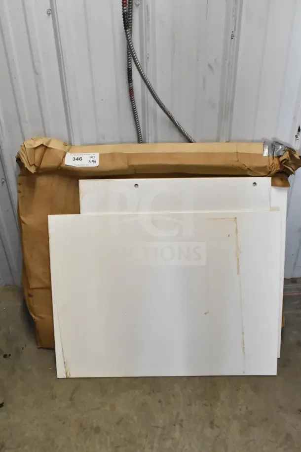 Four various boards with a brown packing label marked "Qty X-14Y 346", slight wear visible, auction item.