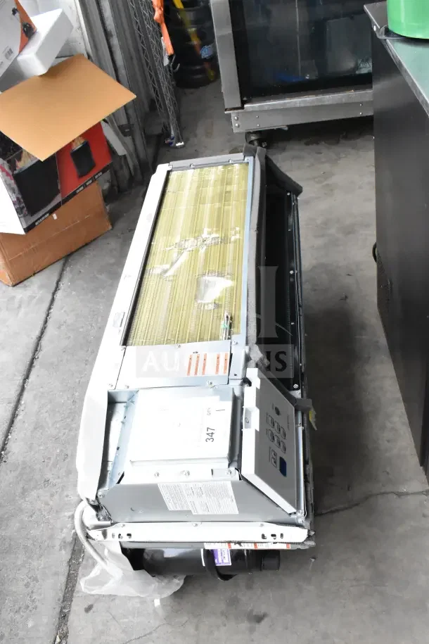 Friedrich ZoneAire Select PTAC with Heat Pump, 12,000 BTU. Model PZH12K3SC, 208/230V, 1 Phase. Features labels and controls.