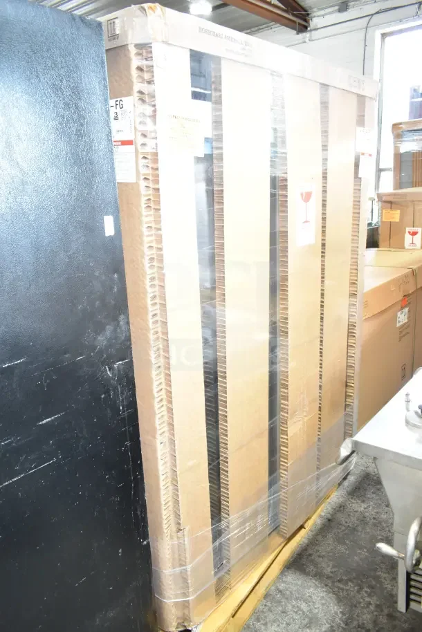 Brand new 2023 Hoshizaki HXF2A-FG freezer, 55", two-section, glass doors, in packaging. Scratch and dent condition.