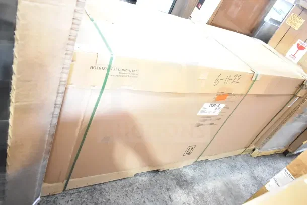 Brand new Hoshizaki CC80-S horizontal bottle cooler, 115V, 1 phase, in original packaging with minor scratches and dents.