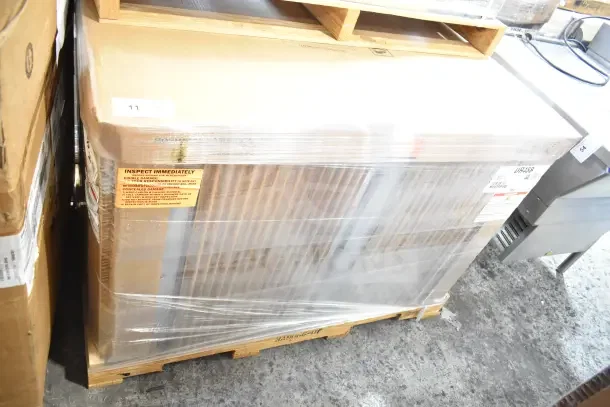 Brand new 2023 Hoshizaki UR48B undercounter refrigerator, 115 volts, 1 phase, wrapped on pallet, with inspection labels.