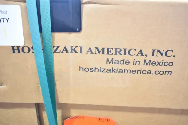 Brand new Hoshizaki HBB-3-69 cooler in packaging. Box marked "Made in Mexico" with hoshizakiamerica.com label.