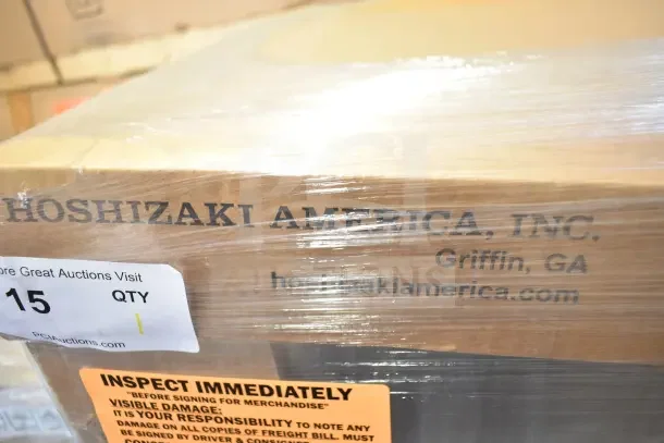 Cardboard box labeled "Hoshizaki America, Inc." with address and website. Tag indicates new 2022 Hoshizaki SR72B-16 prep table.