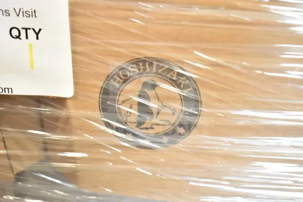 2023 Hoshizaki KMD-860MRJZ ice machine, 967 lb. capacity, 230V, 1 phase, wrapped packaging, logo visible.