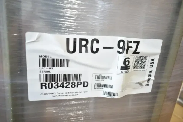 Brand new 2026 Hoshizaki URC-9FZ air-cooled remote ice machine condenser, 115V, with scratch and dent. Model and serial labels visible.
