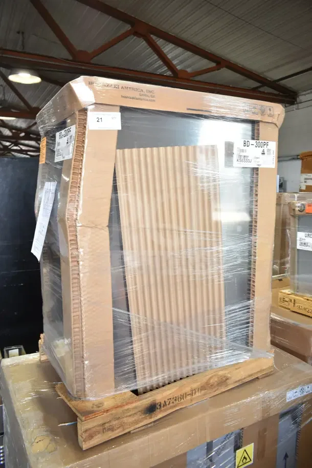 Brand new 2020 Hoshizaki BD-300PF 22" ice bin, 300 lbs capacity, in packaging, some scratches and dents visible.