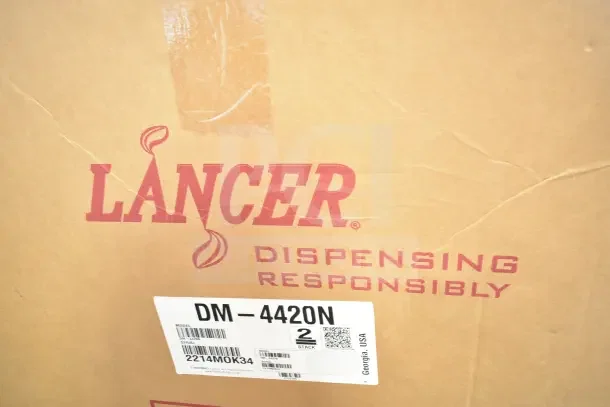 Lancer DM-4420N Cubelet Ice and Water Dispenser in box, model and serial labels visible, new condition with scratches.